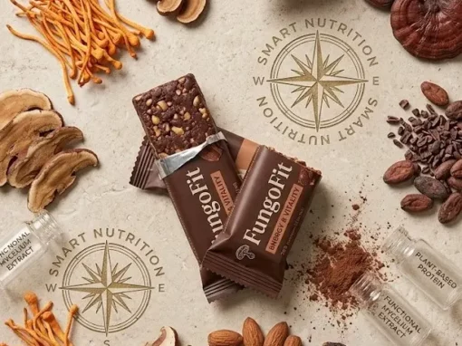 A spread of healthy snack ideas including protein bars, nuts and fresh fruit